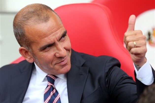 FILE- In this Sunday, Sept. 22, 2013 file photo, Sunderland's manager Paolo Di Canio gestures,  ahead of their English Premier League soccer match against Fulham at the Stadium of Light, Sunderland, England, Saturday, Aug. 17, 2013. Paolo Di Canio became the first managerial casualty of the Premier League season on Sunday, Sept. 22, 2013,  as one of English football’s most divisive reigns came to an end after six months. Sunderland announced it had “parted company” with the 45-year-old Italian a day after a 3-0 loss to West Bromwich Albion left the northeast club bottom of the standings.  (AP Photo/Scott Heppell, File)