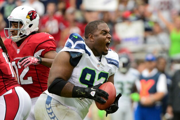 Sept. 8, 2012; Glendale, AZ, USA; Seattle Seahawks defensive tackle Brandon Mebane (92) celebrates after recovering a fumble during the first half against the Arizona Cardinals at University of Phoenix Stadium. Mandatory Credit: Matt Kartozian-USA TODAY Sports