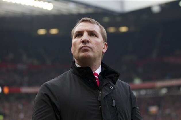 Liverpool manager Brendan Rodgers takes to the touchline prior to the English Premier League soccer match against Manchester United at Old Trafford Stadium, Manchester, England, Sunday Jan. 13, 2013. (AP Photo/Jon Super)