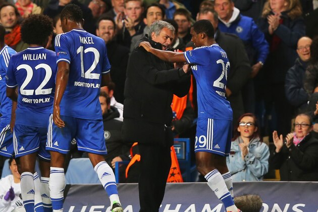 LONDON, ENGLAND - NOVEMBER 06:  Samuel Eto'o of Chelsea celebrates with Jose Mourinho the Chelsea manager after scoring the opening goal during the UEFA Champions League Group E match between Chelsea and FC Schalke 04 at Stamford Bridge on November 6, 2013 in London, England.  (Photo by Clive Rose/Getty Images)