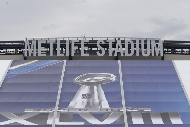 EAST RUTHERFORD, NJ - JANUARY 27:   Super Bowl signs are seen at MetLife Stadium as the venue is prepared to host Super Bowl XLVIII between the Denver Broncos and the Seattle Seahawks January 27, 2014 in East Rutherford, New Jersey.  (Photo by Jeff Zelevansky/Getty Images)