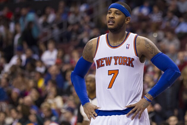 New York Knicks' Carmelo Anthony looks on during the second half of an NBA basketball game against the Philadelphia 76ers, Saturday, Jan. 11, 2014, in Philadelphia.  The Knicks win 102-92.  (AP Photo/Chris Szagola)