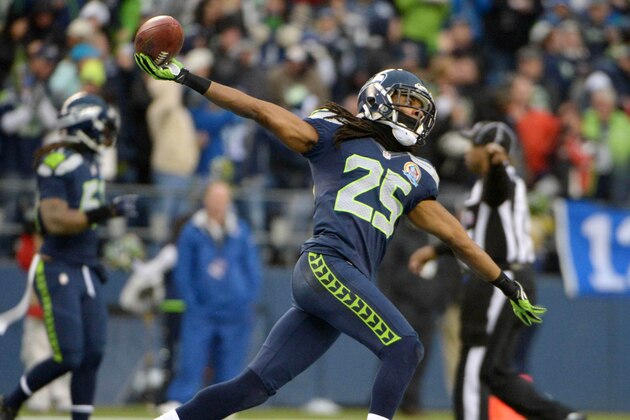 Dec 9, 2012; Seattle, WA, USA; Seattle Seahawks cornerback Richard Sherman (25) celebrates after a fumble recovery against the Arizona Cardinals in the third quarter at CenturyLink Field. The Seahawks defeated the Cardinals 58-0. Mandatory Credit: Kirby Lee/Image of Sport-USA TODAY Sports