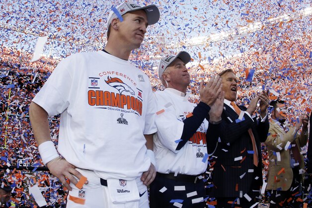 ADVANCE FOR WEEKEND EDITIONS, JAN. 25-26 - In this Jan. 19, 2014, file photo, Denver Broncos quarterback Peyton Manning, stands with  head coach  John Fox and Broncos vice president John Elway during the trophy ceremony after the AFC Championship NFL playoff football game in Denver. When he faces the Seattle Seahawks next Sunday, Manning can become the first starting quarterback to win the Super Bowl with two franchises. (AP Photo/Charlie Riedel, File)