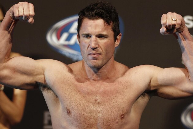 Aug 16, 2013; Boston, MA, USA; Chael Sonnen flexes during the weigh-in for his UFC fight at TD Garden. Mandatory Credit: Winslow Townson-USA TODAY Sports