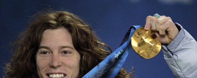 USA's gold medalist Shaun White reacts during the men's halfpipe medal ceremony at the Vancouver 2010 Olympics in Vancouver, British Columbia, Thursday, Feb. 18, 2010. (AP Photo/Jae C. Hong)