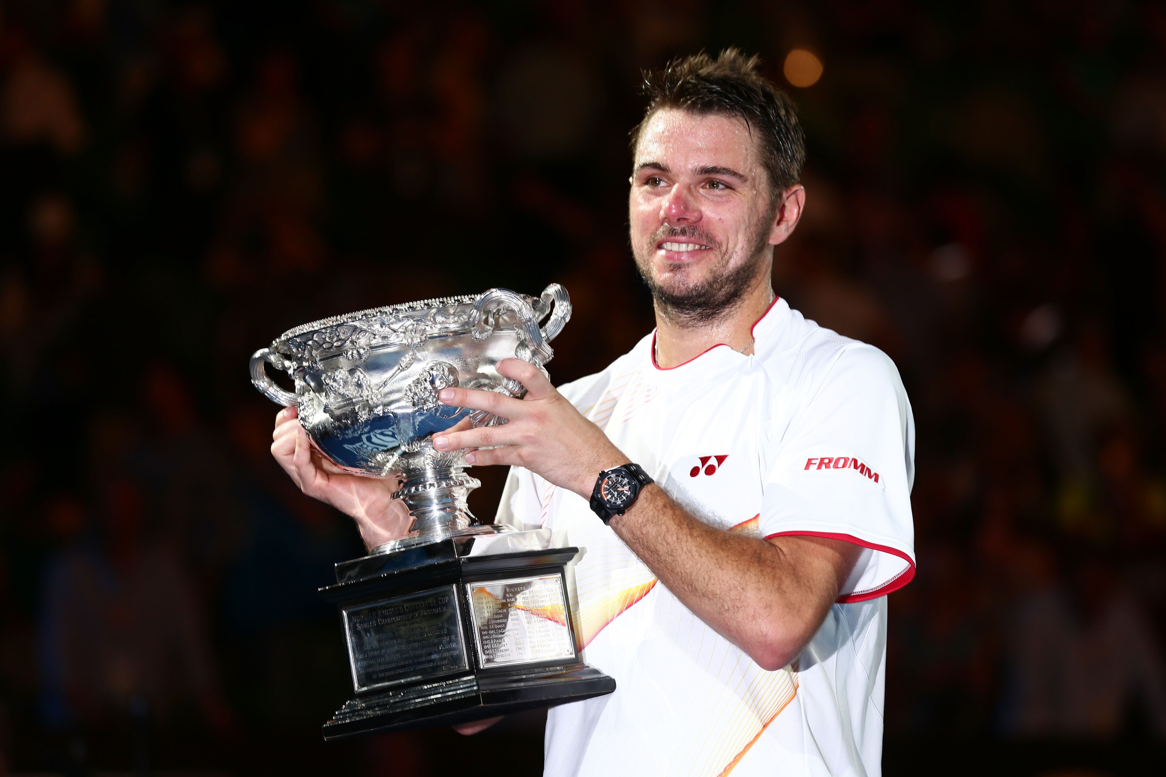 MELBOURNE, AUSTRALIA - JANUARY 26:  Stanislas Wawrinka of Switzerland holds the Norman Brookes Challenge Cup after winning his men's final match against Rafael Nadal of Spain during day 14 of the 2014 Australian Open at Melbourne Park on January 26, 2014 in Melbourne, Australia.  (Photo by Matt King/Getty Images)