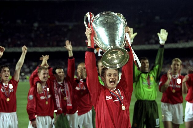 26 May 1999:  Ole Gunnar Solskjaer holds aloft the European Cup after Manchester United win the European Champions League Final against Bayern Munich in the Nou Camp Stadium, Barcelona, Spain. Manchester United won 2 - 1 with Solskjaer scoring the secondgoal, and both United goals scored during injury time, to secure the treble of League, FA Cup and European Cup. \ Mandatory Credit: Alex Livesey /Allsport
