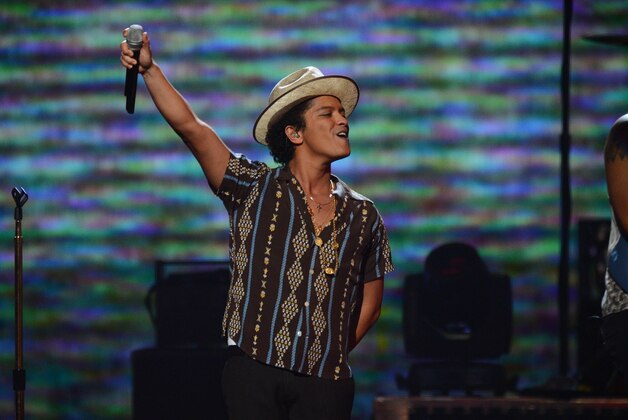 Bruno Mars performs at IHeartRadio Music Festival, day 2, Saturday, September, 21, 2013 in Las Vegas, NV. (Photo by Al Powers/Powers Imagery/Invision /AP)