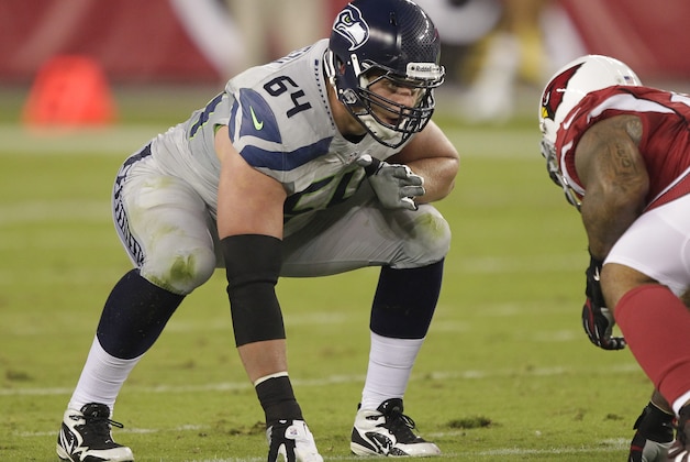 Seattle Seahawks guard J.R. Sweezy (64) during the fist quarter of an NFL football game against the Arizona Cardinals on Sunday, Oct. 17, 2013  in Glendale, Ariz. (AP Photo/Rick Scuteri)