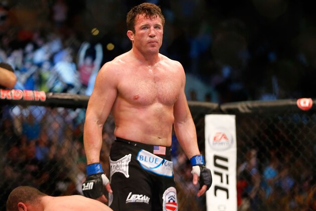 BOSTON, MA - AUGUST 17: Chael Sonnen reacts after winning the fight with a tap out by guillotine choke against Mauricio Rua in their light heavyweight bout at TD Garden on August 17, 2013 in Boston, Massachusetts. (Photo by Jared Wickerham/Getty Images)