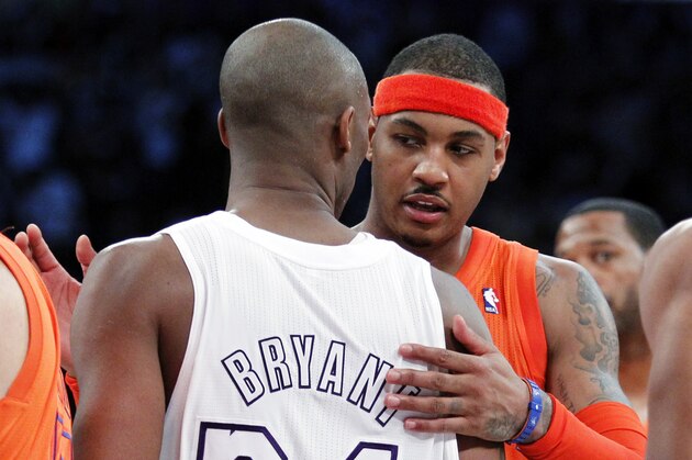 New York Knicks forward Carmelo Anthony congratulates Los Angeles Lakers guard Kobe Bryant (24) after their NBA basketball game in Los Angeles, Tuesday, Dec. 25, 2012. The Lakers won 100-94. (AP Photo/Alex Gallardo)