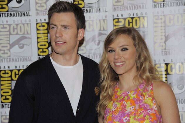 Chris Evans, left, and Scarlett Johansson attends the