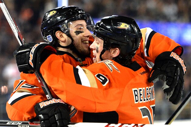 LOS ANGELES, CA - JANUARY 25:  Nick Bonino #13 of the Anaheim Ducks celebrates his goal with Matt Beleskey #39 to take a 2-0 lead over the Los Angeles Kings during the 2014 Coors Light NHL Stadium Series at Dodger Stadium on January 25, 2014 in Los Angeles, California.  (Photo by Harry How/Getty Images)
