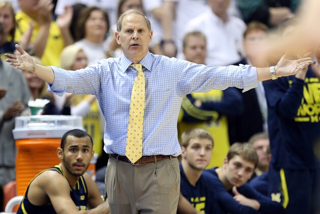 Jan 25, 2014; East Lansing, MI, USA; Michigan Wolverines head coach John Beilein  reacts to a play during the 2nd half of a game at Jack Breslin Student Events Center. Michigan won 80-75. Mandatory Credit: Mike Carter-USA TODAY Sports