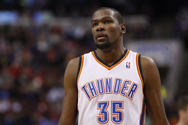 Oklahoma City Thunder's Kevin Durant looks on during the second half of an NBA basketball game against the Philadelphia 76ers, Saturday, Jan. 25, 2014, in Philadelphia. The Thunder won 103-91. (AP Photo/Chris Szagola)