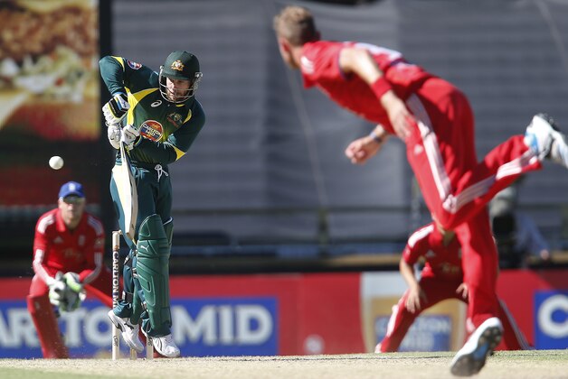 Australia's Matthew Wade plays a shot from the bowling of England's Stuart Broad during their one day international cricket match in Perth, Australia, Friday, Jan. 24, 2014. (AP Photo/Theron Kirkman)