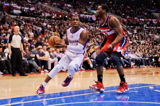 LOS ANGELES, CA - JANUARY 19: Chris Paul #3 of the Los Angeles Clippers drives against John Wall #2 of the Washington Wizards at Staples Center on January 19, 2013 in Los Angeles, California. NOTE TO USER: User expressly acknowledges and agrees that, by downloading and/or using this photograph, user is consenting to the terms and conditions of the Getty Images License Agreement. Mandatory Copyright Notice: Copyright 2013 NBAE (Photo by Noah Graham/NBAE via Getty Images) LOS ANGELES, CA - JANUARY 19: Chris Paul #3 of the Los Angeles Clippers drives against John Wall #2 of the Washington Wizards at Staples Center on January 19, 2013 in Los Angeles, California. NOTE TO USER: User expressly acknowledges and agrees that, by downloading and/or using this photograph, user is consenting to the terms and conditions of the Getty Images License Agreement. Mandatory Copyright Notice: Copyright 2013 NBAE (Photo by Noah Graham/NBAE via Getty Images)