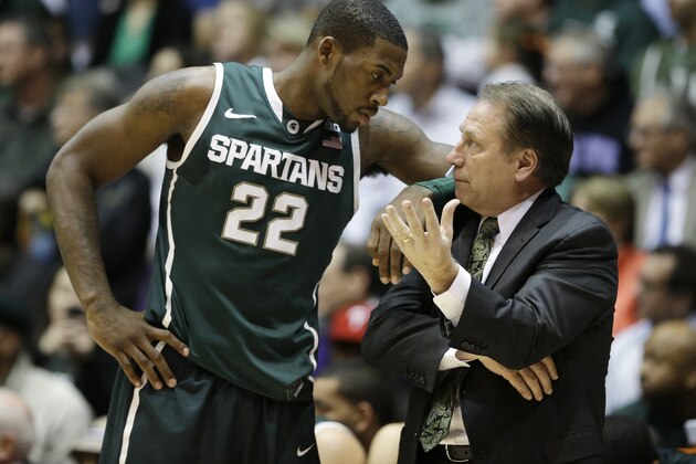 Michigan State guard Branden Dawson, left, listens to head coach Tom Izzo during the second half of an NCAA college basketball game against Northwestern in Evanston, Ill., on Wednesday, Jan. 15, 2014. Michigan State won 54-40. (AP Photo/Nam Y. Huh) Michigan State guard Branden Dawson, left, listens to head coach Tom Izzo during the second half of an NCAA college basketball game against Northwestern in Evanston, Ill., on Wednesday, Jan. 15, 2014. Michigan State won 54-40. (AP Photo/Nam Y. Huh)