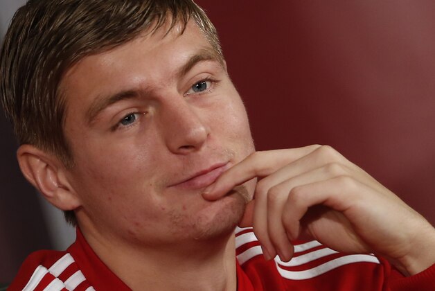 Bayern's Toni Kroos smiles during a news conference at the Club World Cup soccer tournament in Agadir, Morocco, Monday, Dec. 16, 2013. Bayern Munich will face Guangzhou Evergrande in the first semi final on Tuesday, Dec 17. (AP Photo/Matthias Schrader)