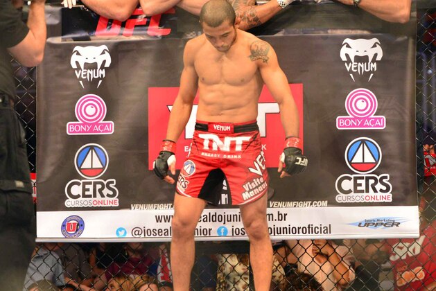 Aug 3, 2013; Rio De Janeiro, Brazil; Jose Aldo (red gloves) in his corner during his fight against Chan Sung Jung during UFC 163 at HSBC Arena. Mandatory Credit: Jason Silva-USA TODAY Sports