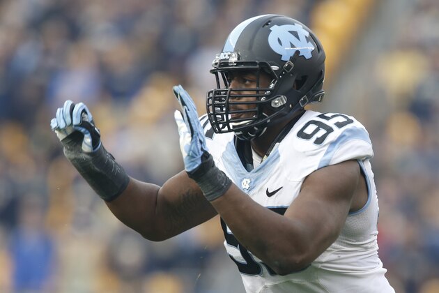 North Carolina defensive end Kareem Martin (95) in action in an NCAA football game between Pittsburgh and North Carolina, Saturday, Nov. 16, 2013 in Pittsburgh. (AP Photo/Keith Srakocic)