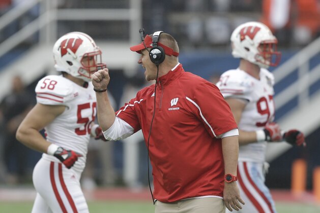 Wisconsin head coach Gary Andersen praises his defense as they come off the field during the first half of the Capital One Bowl NCAA college football game in Orlando, Fla., Wednesday, Jan. 1, 2014.(AP Photo/John Raoux) Wisconsin head coach Gary Andersen praises his defense as they come off the field during the first half of the Capital One Bowl NCAA college football game in Orlando, Fla., Wednesday, Jan. 1, 2014.(AP Photo/John Raoux)