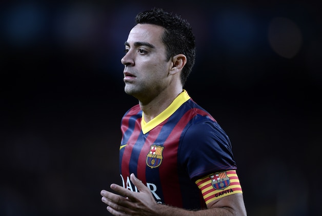 FC Barcelona's Xavi Hernandez in action against Espanyol during a Spanish La Liga soccer match at the Camp Nou stadium in Barcelona, Spain, Friday, Nov. 1, 2013. (AP Photo/Manu Fernandez)