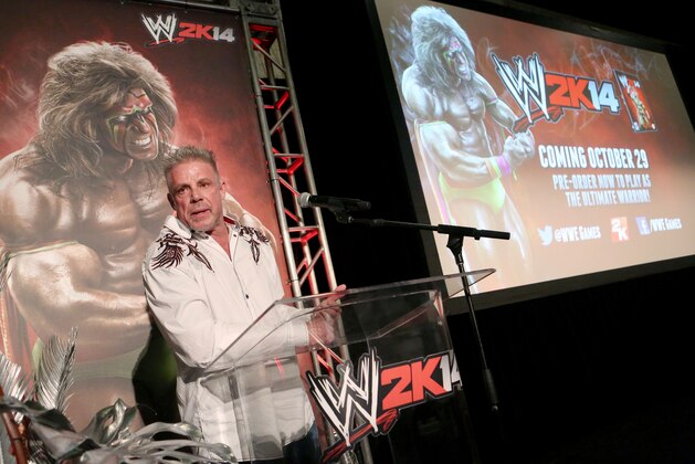 IMAGE DISTRIBUTED FOR 2K - Warrior talks about his career as the Ultimate Warrior, a playable WWE Legend, available exclusively by pre-ordering WWE 2K14, on Sunday, Aug. 18, 2013 in Los Angeles.  (Photo by Casey Rodgers/Invision for 2K/AP Images)