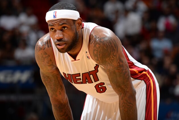 MIAMI, FL- JANUARY 21:  LeBron James #6 of the Miami Heat during the game against the Boston Celtics at the American Airlines Arena in Miami, Florida on January 21, 2014.  NOTE TO USER: User expressly acknowledges and agrees that, by downloading and or using this photograph, User is consenting to the terms and conditions of the Getty Images License Agreement. Mandatory Copyright Notice: Copyright 2014 NBAE  (Photo by Andrew D. Bernstein/NBAE via Getty Images)