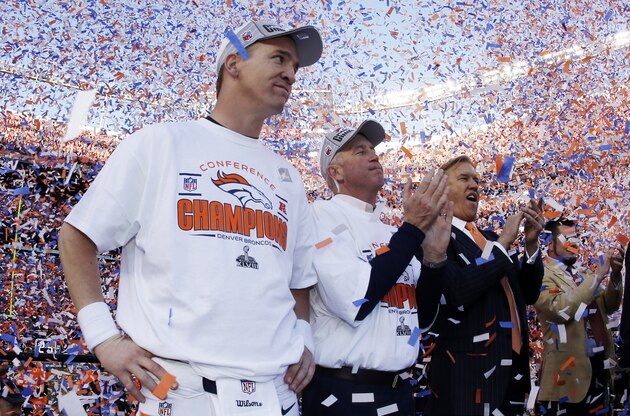 ADVANCE FOR WEEKEND EDITIONS, JAN. 25-26 - In this Jan. 19, 2014, file photo, Denver Broncos quarterback Peyton Manning, stands with  head coach  John Fox and Broncos vice president John Elway during the trophy ceremony after the AFC Championship NFL playoff football game in Denver. When he faces the Seattle Seahawks next Sunday, Manning can become the first starting quarterback to win the Super Bowl with two franchises. (AP Photo/Charlie Riedel, File)