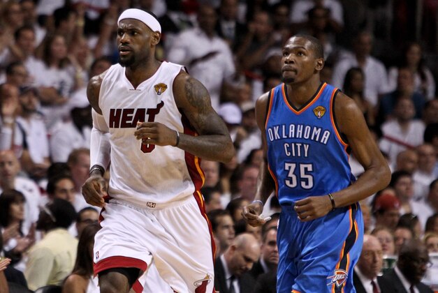Jun 17, 2012; Miam, FL, USA; Miami Heat small forward LeBron James (6) and Oklahoma City Thunder small forward Kevin Durant (35) during the first quarter in game three in the 2012 NBA Finals at the American Airlines Arena. Mandatory Credit: Derick E. Hingle-USA TODAY Sports