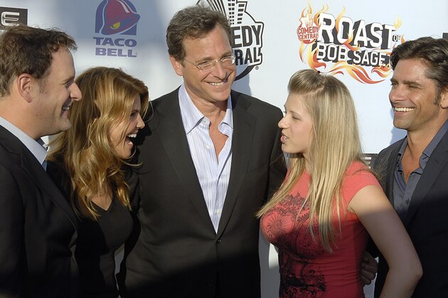 From left to right, actor Dave Coulier, actress Lori Loughlin, actor Bob Saget, actress Jodie Sweetin, and actor John Stamos pose on the press line at the