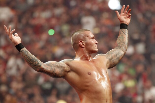WWE Superstar Randy Orton celebrates victory during WrestleMania XXVI on March 28, 2010, at University of Phoenix Stadium in Glendale, Arizona. (AP Photo/Rick Scuteri)