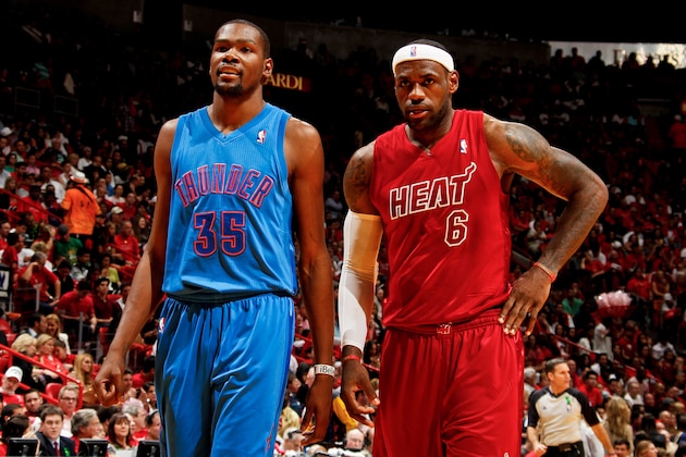 MIAMI, FL - DECEMBER 25: Kevin Durant #35 of the Oklahoma City Thunder and LeBron James #6 of the Miami Heat wait to resume play during a Christmas Day game on December 25, 2012 at American Airlines Arena in Miami, Florida. NOTE TO USER: User expressly acknowledges and agrees that, by downloading and/or using this photograph, user is consenting to the terms and conditions of the Getty Images License Agreement. Mandatory copyright notice: Copyright NBAE 2012 (Photo by Issac Baldizon/NBAE via Getty Images)