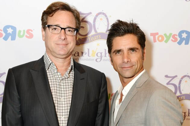 Bob Saget, left, and John Stamos attend the Starlight Awards at the Skirball Cultural Center on Wednesday, Sept. 25, 2013, in Los Angeles. (Photo by Jordan Strauss/Invision for Starlight Children's Foundation/AP Images)