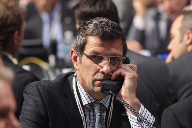 PITTSBURGH, PA - JUNE 22: Montreal Canadiens Marc Bergevin speaks on the phone during Round One of the 2012 NHL Entry Draft at Consol Energy Center on June 22, 2012 in Pittsburgh, Pennsylvania.  (Photo by Bruce Bennett/Getty Images)