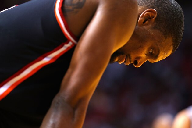 MIAMI, FL - JANUARY 26:  Chris Bosh #1 of the Miami Heat looks on during a game against the San Antonio Spurs at American Airlines Arena on January 26, 2014 in Miami, Florida. NOTE TO USER: User expressly acknowledges and agrees that, by downloading and/or using this photograph, user is consenting to the terms and conditions of the Getty Images License Agreement. Mandatory copyright notice:  (Photo by Mike Ehrmann/Getty Images)