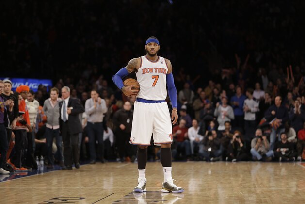 New York Knicks' Carmelo Anthony holds the ball at the second half of the NBA basketball game against the Los Angeles Lakers at Madison Square Garden Sunday, Jan. 26, 2014, in New York. The Knicks defeated the Lakers 110-103. (AP Photo/Seth Wenig)