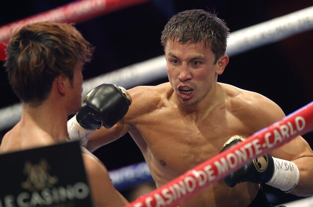 Gennady Golovkin, of Kazakhstan, right,  fights against Nobuhiro Ishida, of Japan, during their WBA middleweight title fight, Saturday March 30, 2013, in Monaco. Golovkin stopped Ishida in the third round to successfully defend his WBA and IBO middleweight titles Saturday night. (AP Photo/Lionel Cironneau)