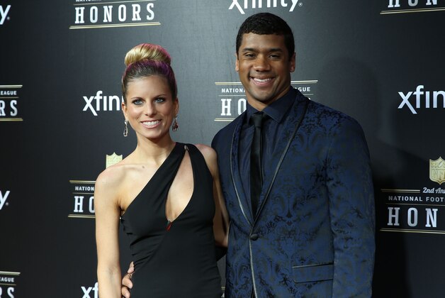 Feb. 2, 2013; New Orleans, LA, USA: Seattle Seahawks quarterback Russell Wilson (right) with wife Ashton Wilson on the red carpet prior to the Super Bowl XLVII NFL Honors award show at Mahalia Jackson Theater. Mandatory Credit: Mark J. Rebilas-USA TODAY Sports