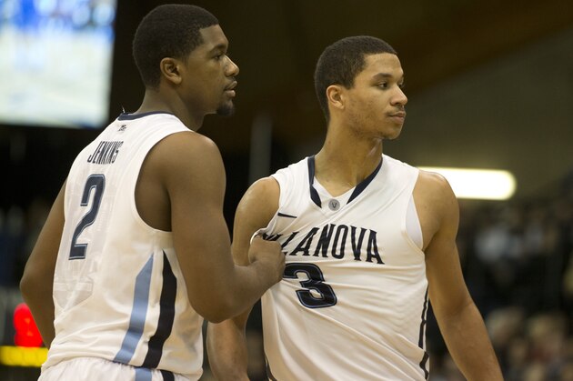 VILLANOVA, PA - JANUARY 18: Guard Kris Jenkins #2 pulls guard #3 Josh Hart of Villanova Wildcats away from a crowd after a technical foul was called against the DePaul Blue Demons on January 18, 2014 at the Pavilion in Villanova, Pennsylvania. (Photo by Mitchell Leff/Getty Images)