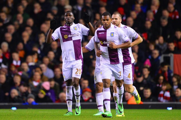 LIVERPOOL, ENGLAND - JANUARY 18: Christian Benteke of Aston Villa celebrates scoring his team's second goal during the Barclays Premier League match between Liverpool and Aston Villa at Anfield on January 18, 2014 in Liverpool, England.  (Photo by Michael Regan/Getty Images)