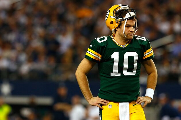 ARLINGTON, TX - DECEMBER 15:  Quarterback Matt Flynn #10 of the Green Bay Packers looks on against the Dallas Cowboys during a game at AT&T Stadium on December 15, 2013 in Arlington, Texas.  (Photo by Tom Pennington/Getty Images)