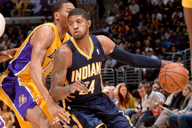 LOS ANGELES, CA - JANUARY 28: Paul George #24 of the Indiana Pacers handles the basketball during a game against the Los Angeles Lakers at STAPLES Center on January 28, 2014 in Los Angeles, California. NOTE TO USER: User expressly acknowledges and agrees that, by downloading and/or using this Photograph, user is consenting to the terms and conditions of the Getty Images License Agreement. Mandatory Copyright Notice: Copyright 2014 NBAE (Photo by Noah Graham/NBAE via Getty Images)