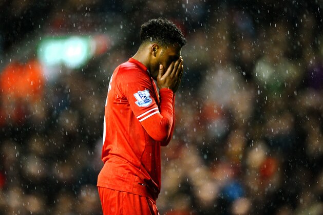 LIVERPOOL, ENGLAND - JANUARY 28:  Daniel Sturridge of Liverpool reacts after missing a penalty during the Barclays Premier League match between Liverpool and Everton at Anfield on January 28, 2014 in Liverpool, England.  (Photo by Laurence Griffiths/Getty Images)