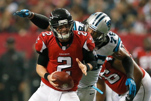 ATLANTA, GA - DECEMBER 29:  Greg Hardy #76 of the Carolina Panthers pressures Matt Ryan #2 of the Atlanta Falcons at Georgia Dome on December 29, 2013 in Atlanta, Georgia.  (Photo by Kevin C. Cox/Getty Images)