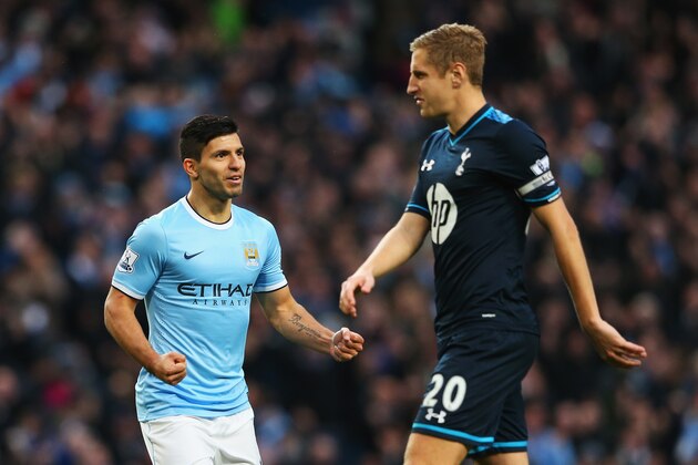 MANCHESTER, ENGLAND - NOVEMBER 24:  Sergio Aguero of Manchester City celebrates his second goal as Michael Dawson of Tottenham Hotspur looks dejected during the Barclays Premier League match between Manchester City and Tottenham Hotspur at Etihad Stadium on November 24, 2013 in Manchester, England.  (Photo by Alex Livesey/Getty Images)