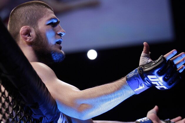 Khabib Nurmagomedov, from Russia, celebrates after Thiago Tavares, from Brazil, during their lightweight mixed martial arts bout at the Ultimate Fighting Championship (UFC) in Sao Paulo, Brazil, Saturday, Jan. 19, 2013. (AP Photo/Andre Penner) Khabib Nurmagomedov, from Russia, celebrates after Thiago Tavares, from Brazil, during their lightweight mixed martial arts bout at the Ultimate Fighting Championship (UFC) in Sao Paulo, Brazil, Saturday, Jan. 19, 2013. (AP Photo/Andre Penner)