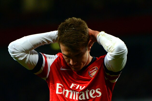 LONDON, ENGLAND - DECEMBER 08:  Aaron Ramsey of Arsenal reacts during the Barclays Premier League match between Arsenal and Everton at Emirates Stadium on December 8, 2013 in London, England.  (Photo by Michael Regan/Getty Images)